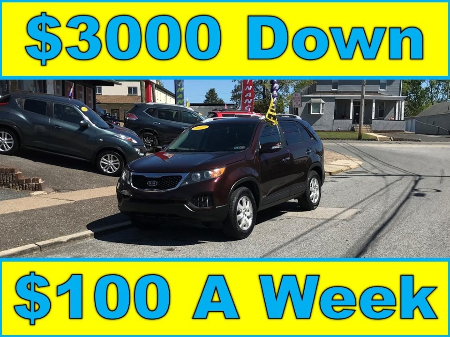 2012 Burgundy /Gray Kia Sorento LX (5XYKTDA29CG) with an 3.5 V6 engine, Automatic transmission, located at 577 Chester Pike, Prospect Park, PA, 19076, (610) 237-1015, 39.886154, -75.302338 - Photo#0